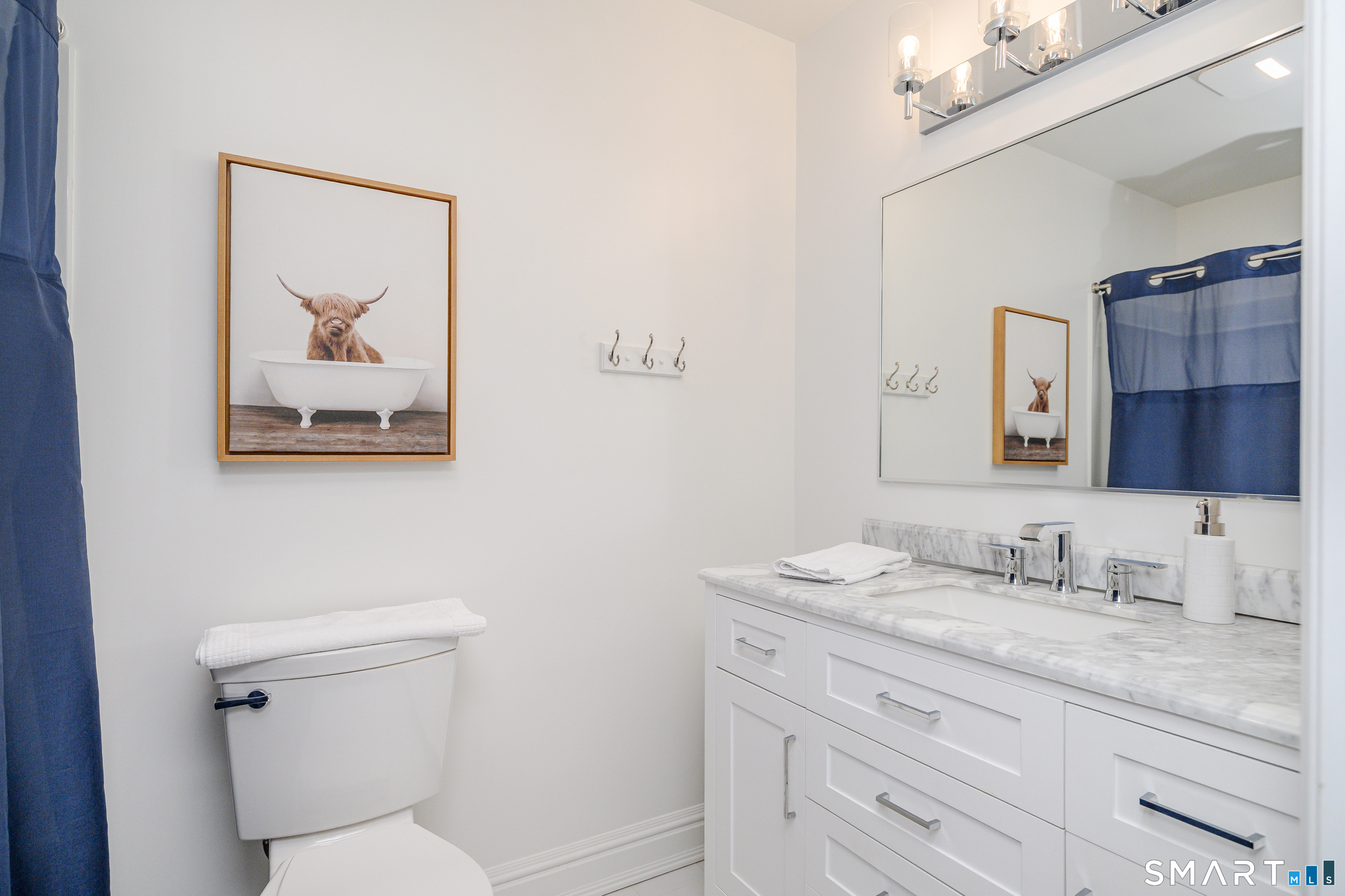 14 Merlins Lane Newtown, CT 06470 - Photo 22 of 40 Full bath with marble-top vanity and shower/tub.