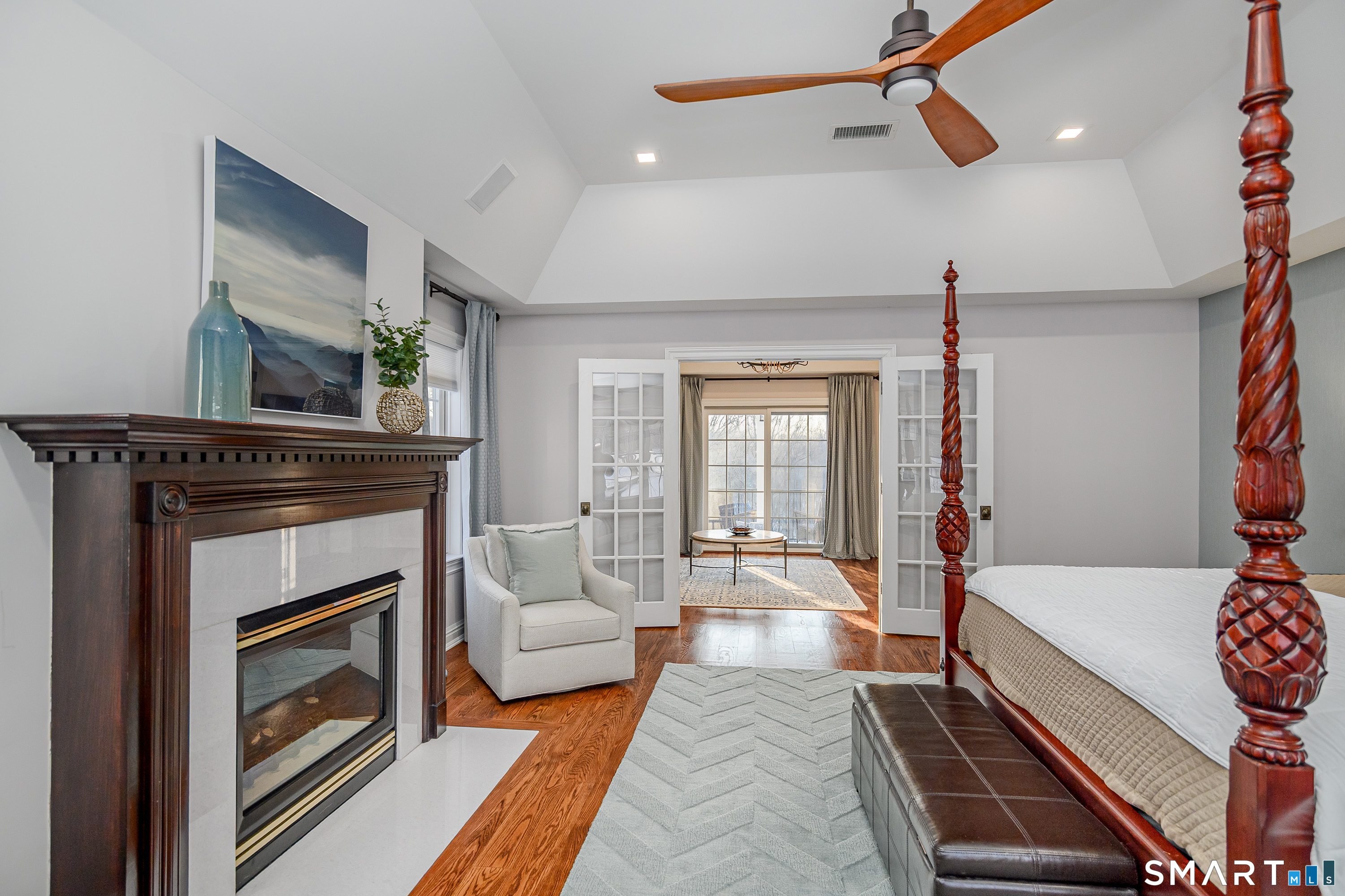 14 Merlins Lane Newtown, CT 06470 - Photo 25 of 40 Primary suite with French doors to lounge