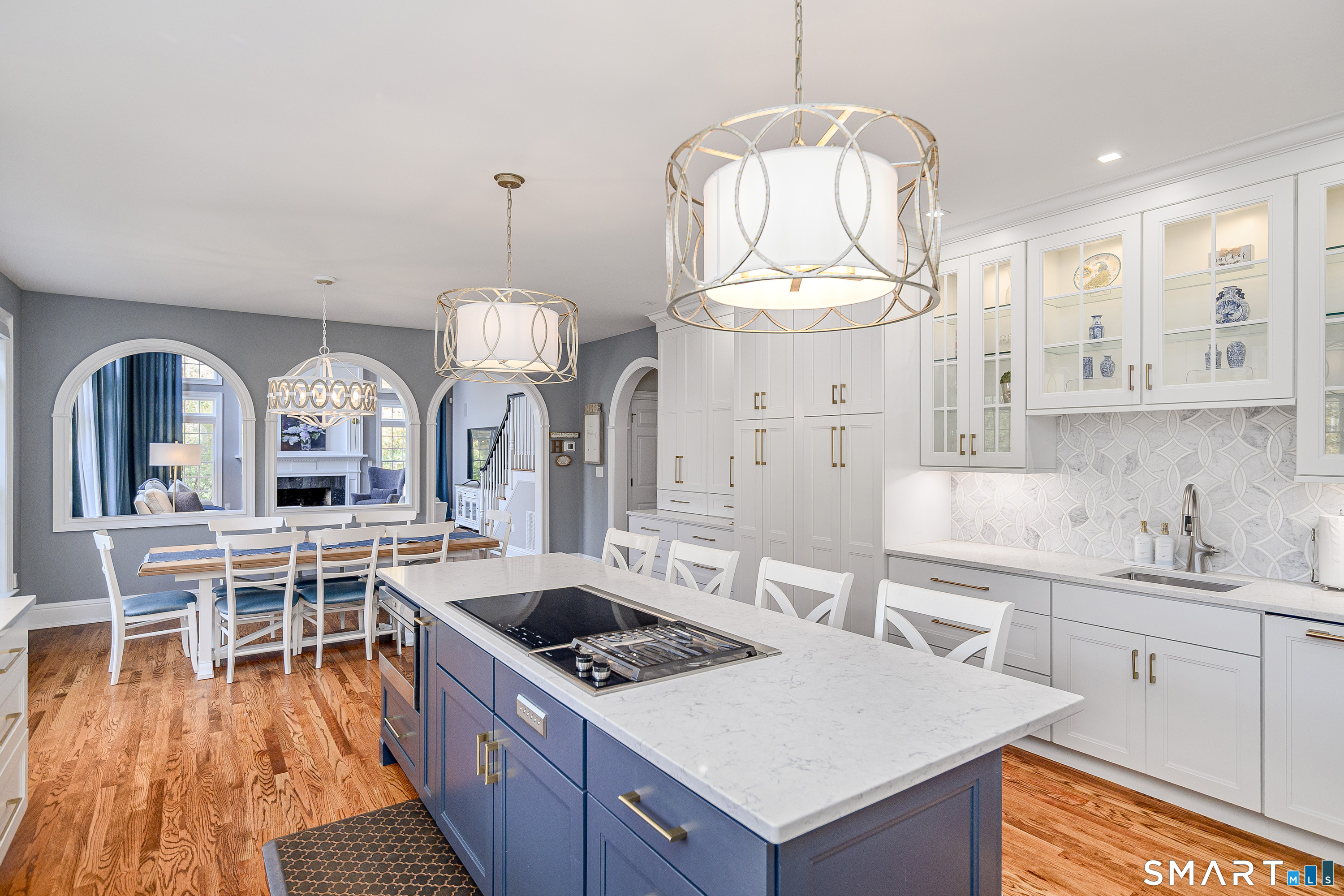 14 Merlins Lane Newtown, CT 06470 - Photo 9 of 40 Spacious island with seating and designer lighting.