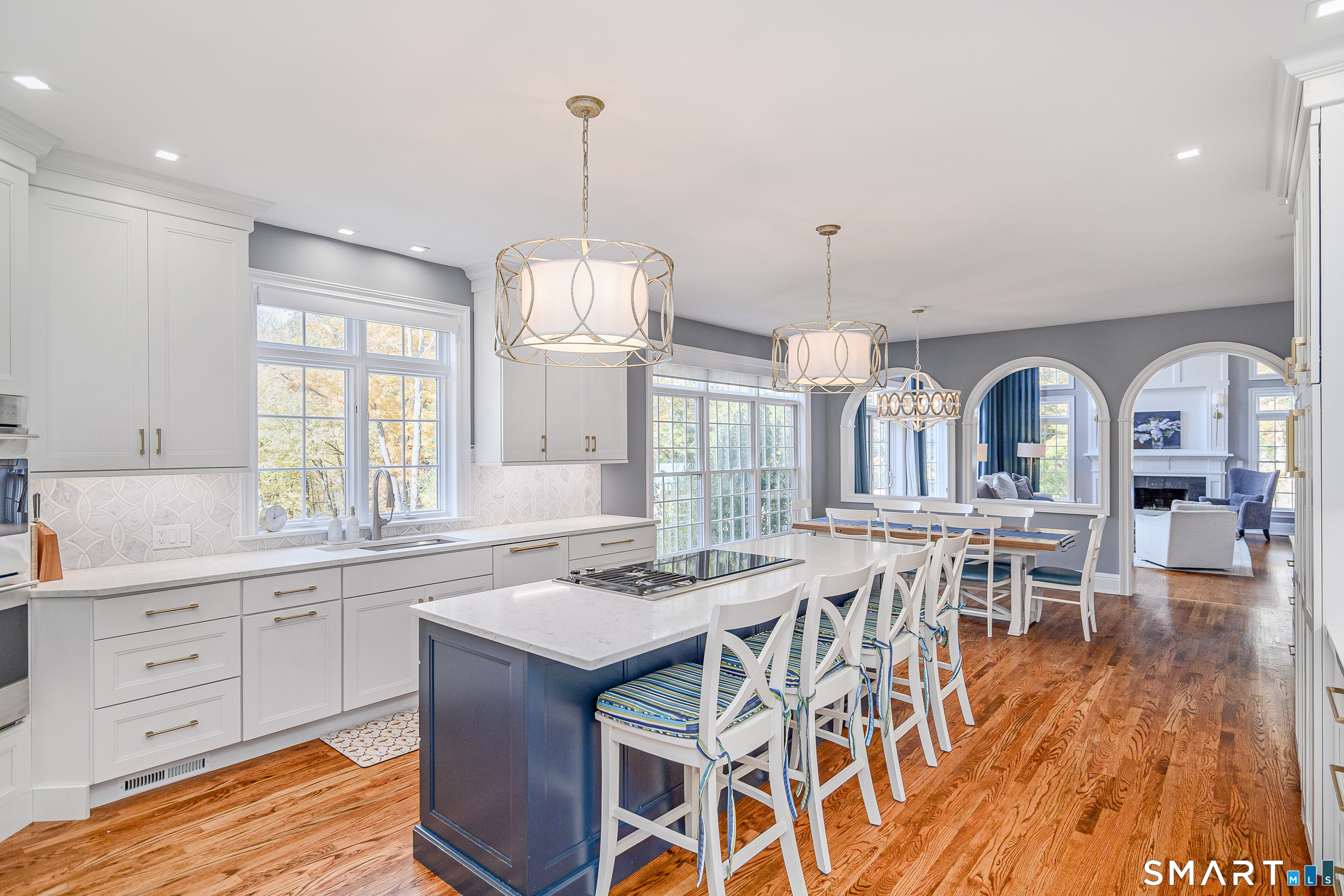 14 Merlins Lane Newtown, CT 06470 - Photo 10 of 40 Updated kitchen with quartz counters and oversized island.