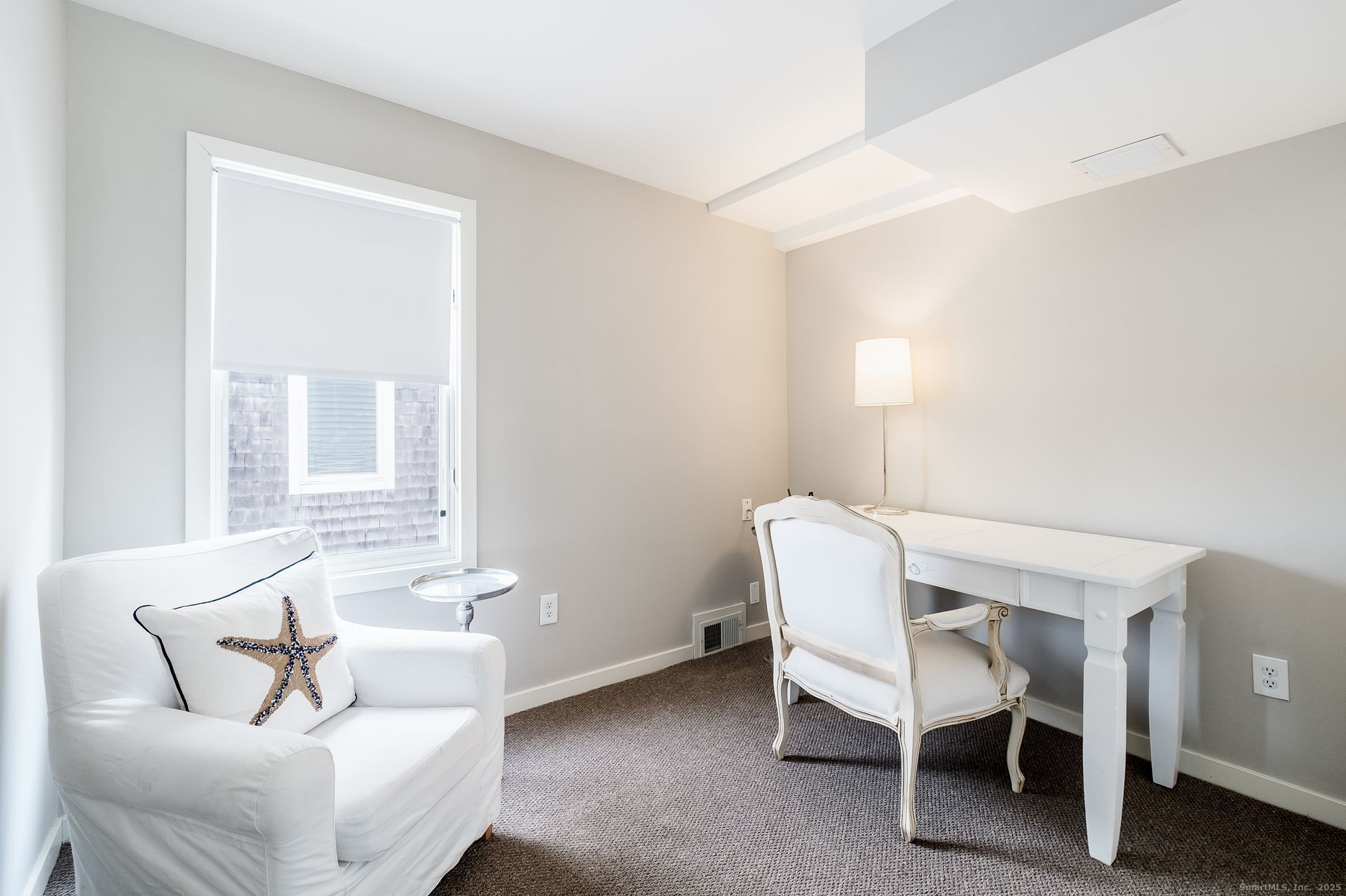 1987 Fairfield Beach Road Fairfield, CT 06824 - Photo 21 of 22 a living room with furniture and a window