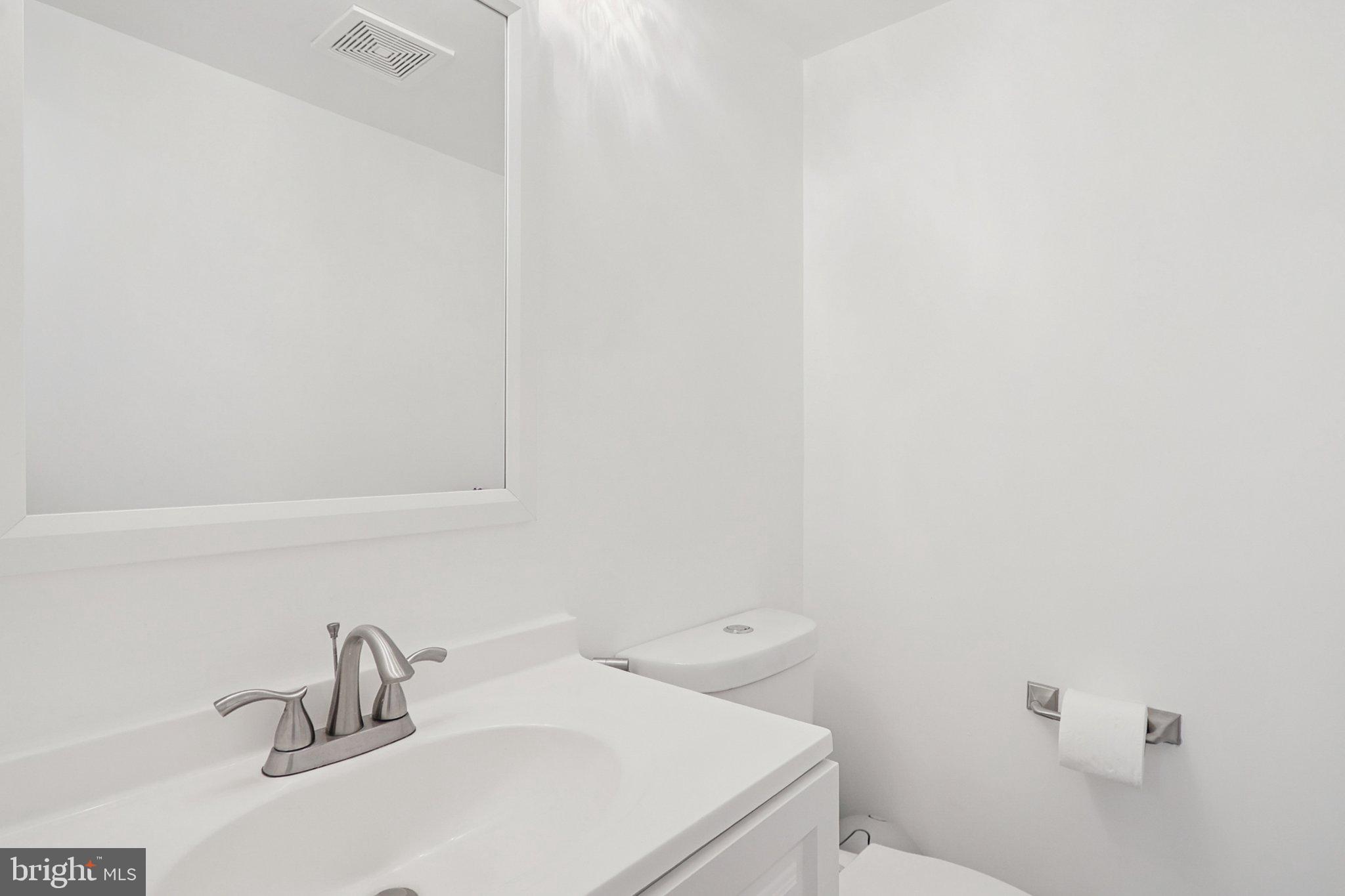 6246 Hillside Road Springfield, VA 22152 - Photo 19 of 41 a bathroom with a sink and a vanity