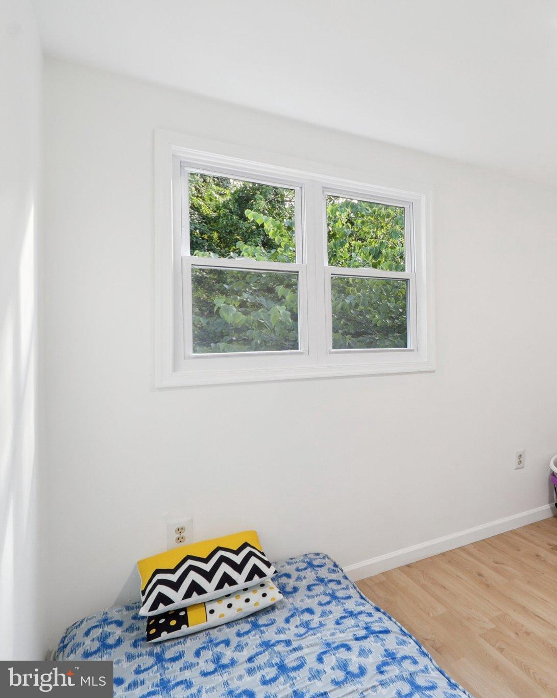 6246 Hillside Road Springfield, VA 22152 - Photo 27 of 41 a room with a bed and a window
