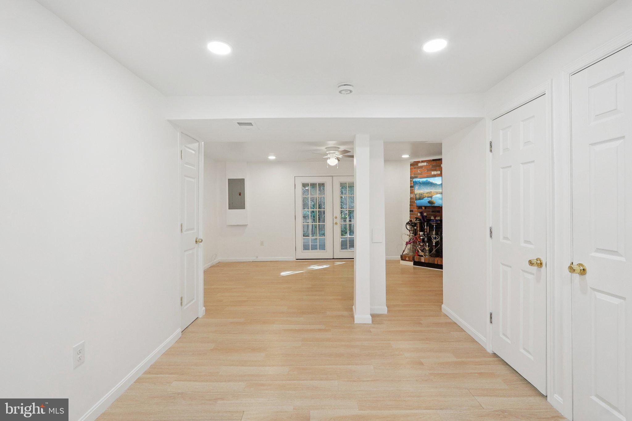 6246 Hillside Road Springfield, VA 22152 - Photo 8 of 41 a view of an empty room with wooden floor