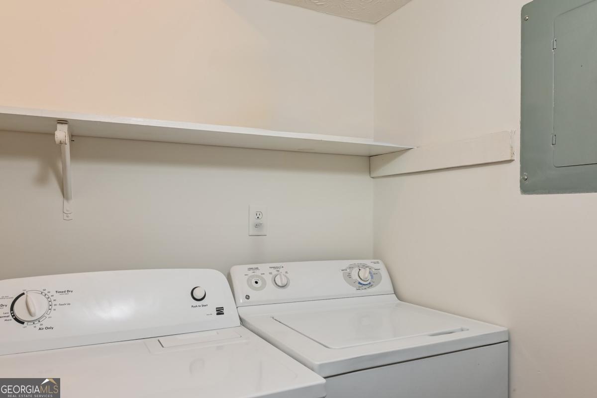 201 Lenox Way Northeast, Unit 201 Atlanta, GA 30324 - Photo 14 of 15 a utility room with dryer and washer