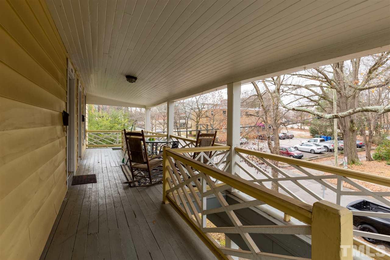 112 Forest Road Raleigh, NC 27605 - Photo 11 of 14 a view of a patio with wooden floor