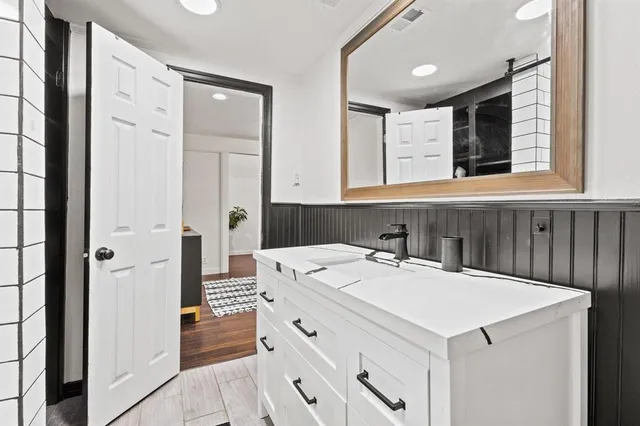 a view of bathroom with dual sinks