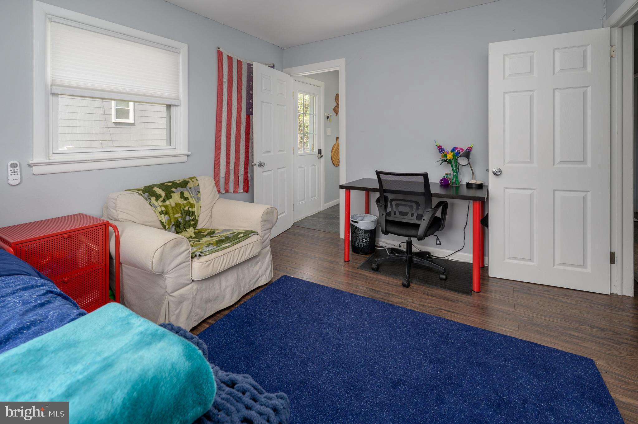 500 Jackson Avenue Magnolia, NJ 08049 - Photo 15 of 21 a living room with furniture and wooden floor
