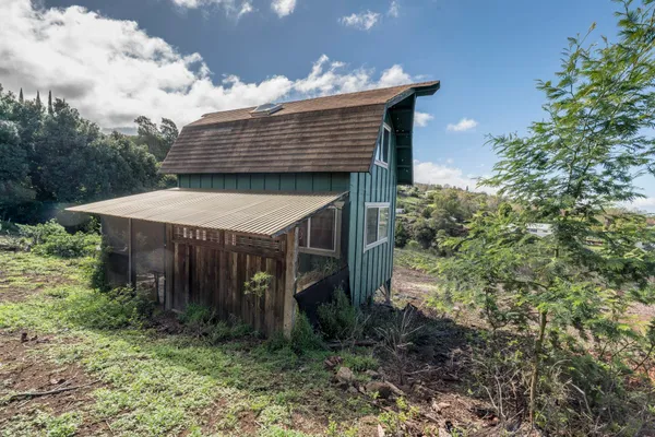 a view of a room with a large window