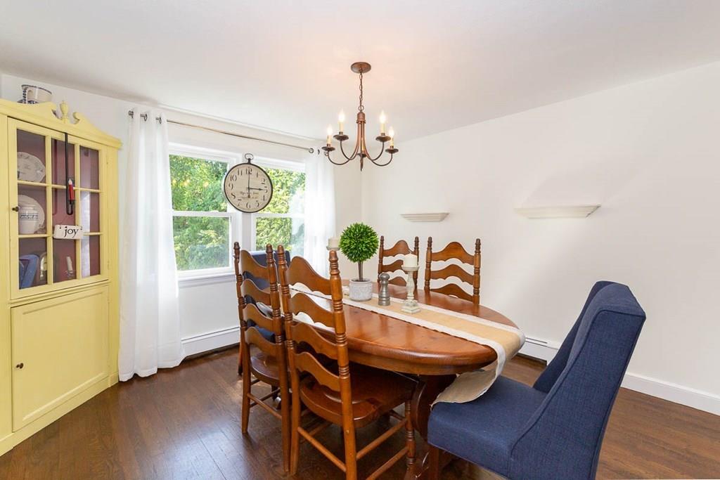 10 Ross Road Lexington, MA 02421 - Photo 12 of 36 a view of a dining room with furniture window and wooden floor