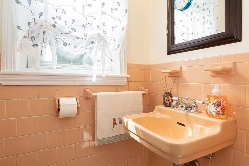 10 Ross Road Lexington, MA 02421 - Photo 13 of 36 a bathroom with a sink and bathtub