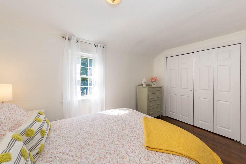 10 Ross Road Lexington, MA 02421 - Photo 25 of 36 a bedroom with a bed and a window