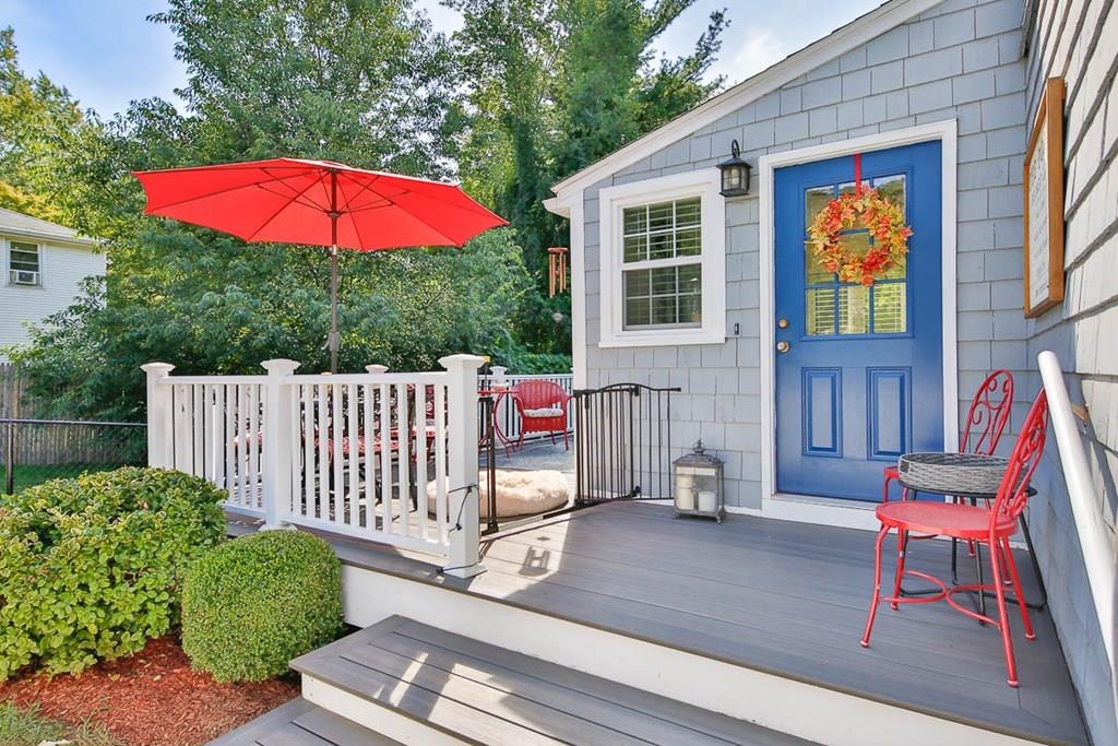 10 Ross Road Lexington, MA 02421 - Photo 36 of 36 an outdoor sitting area with chairs and wooden floor