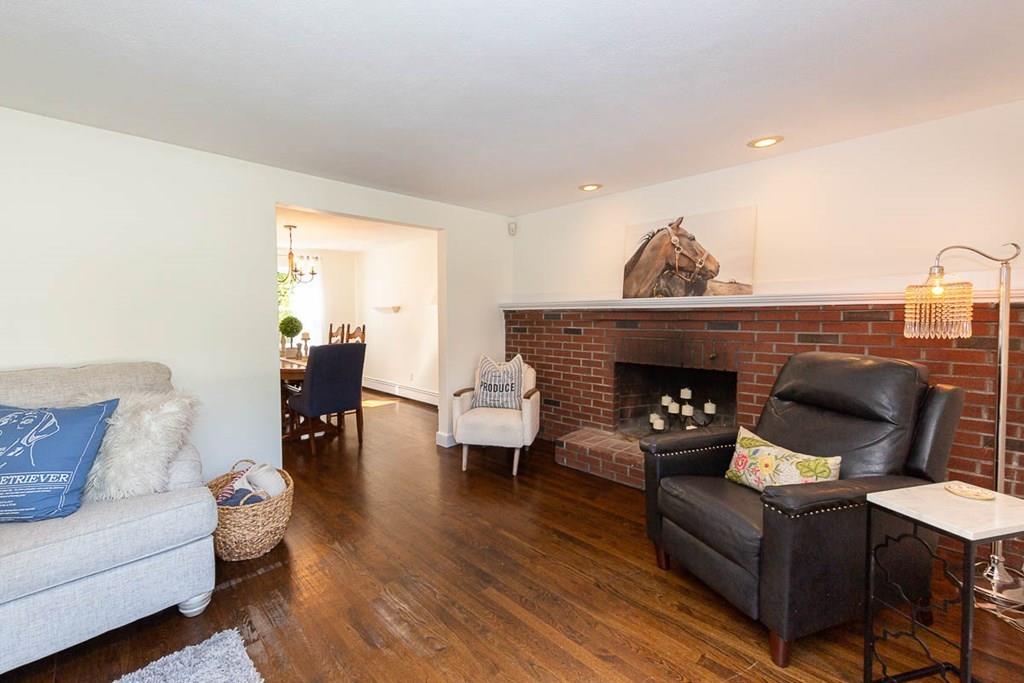 10 Ross Road Lexington, MA 02421 - Photo 10 of 36 a living room with furniture and a fireplace