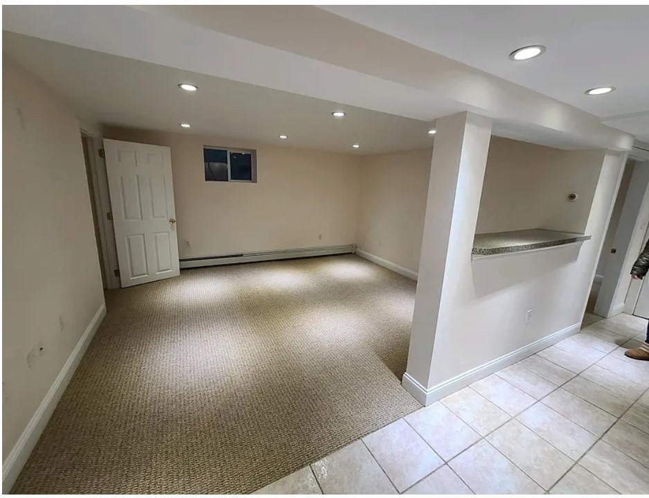 1 Hilltop Road, Unit B Watertown, MA 02472 - Photo 3 of 5 a view of a hallway
