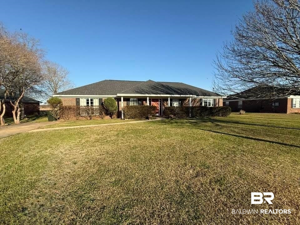 8912 Sherman Road Foley, AL 36535 - Photo 1 of 35 Single story home with a front lawn