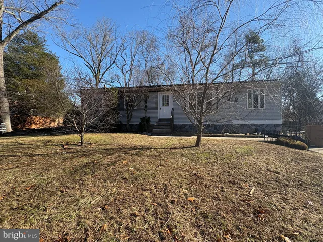 a view of a backyard of the house