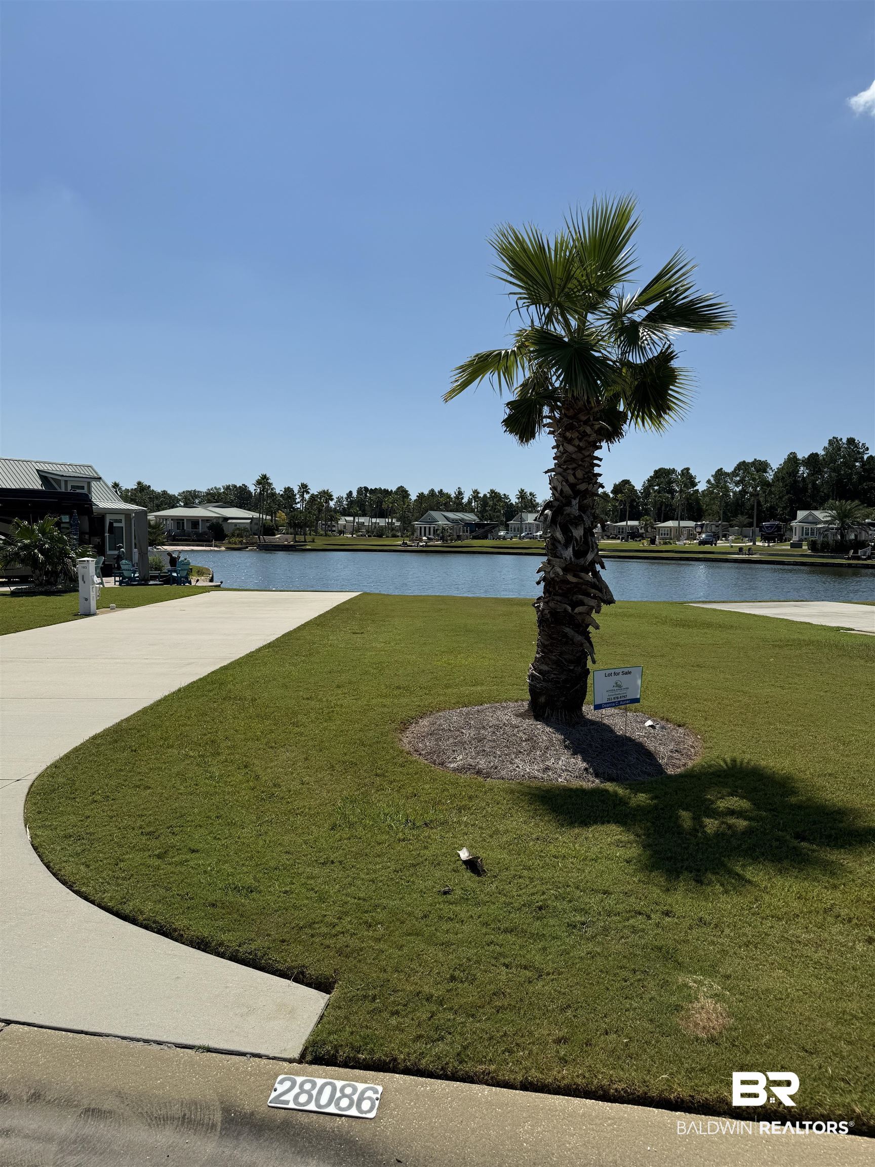 28086 Migratory Way Elberta, AL 36530 - Photo 6 of 46 Surrounding community featuring a lawn and a water view