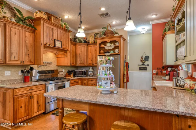 a spacious bedroom with a bed and a fireplace