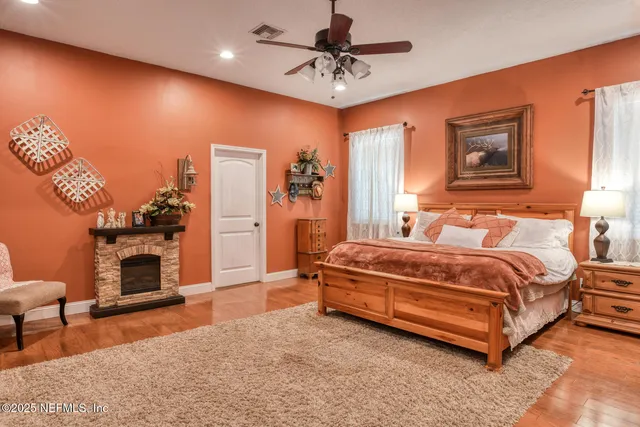 a bedroom with a bed and window