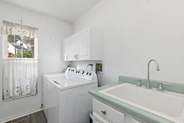 a utility room with dryer and washer