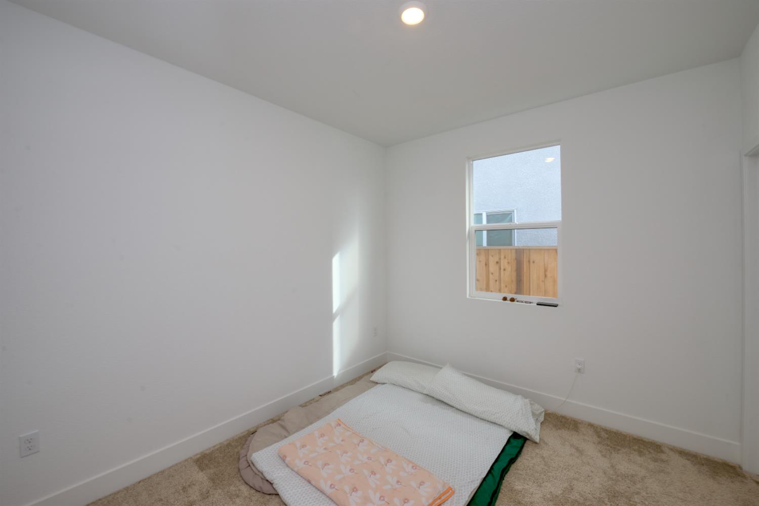 2209 Greenhorn Road Patterson, CA 95363 - Photo 20 of 32 an empty room with windows