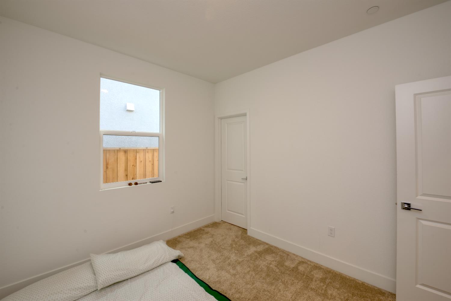 2209 Greenhorn Road Patterson, CA 95363 - Photo 21 of 32 an empty room with a window