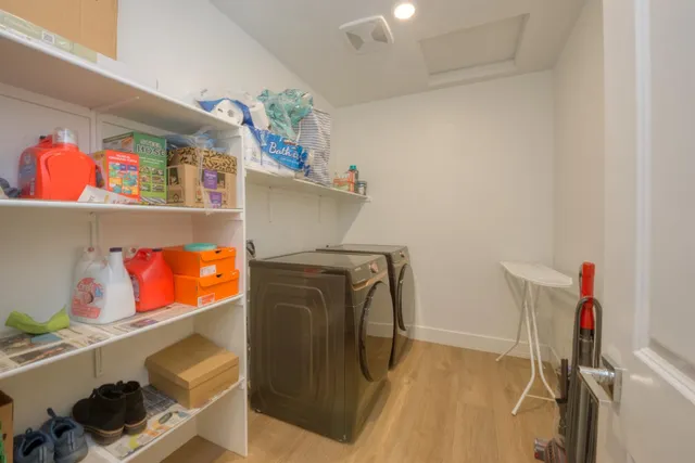 a utility room with dryer and washer