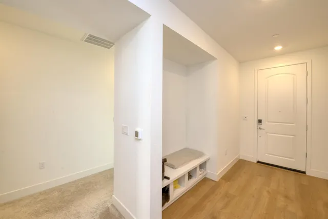 a view of a room with an empty space