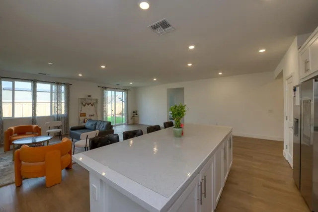 a view of a dining room with furniture