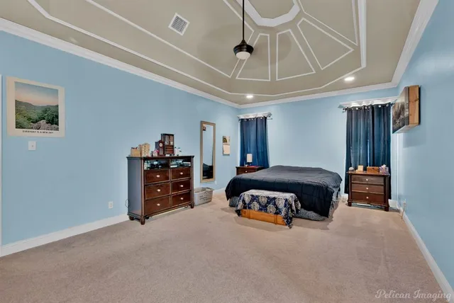 a bedroom with a bed and a walk in closet