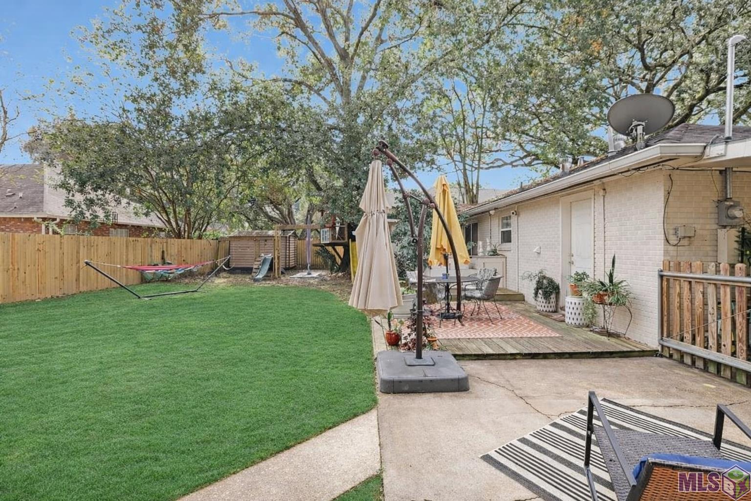 1555 Carter Avenue Baton Rouge, LA 70806 - Photo 20 of 23 An oasis in this fenced yard!
