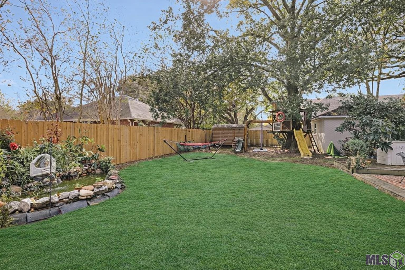1555 Carter Avenue Baton Rouge, LA 70806 - Photo 23 of 23 Enjoy swinging and climing and bring your fish!