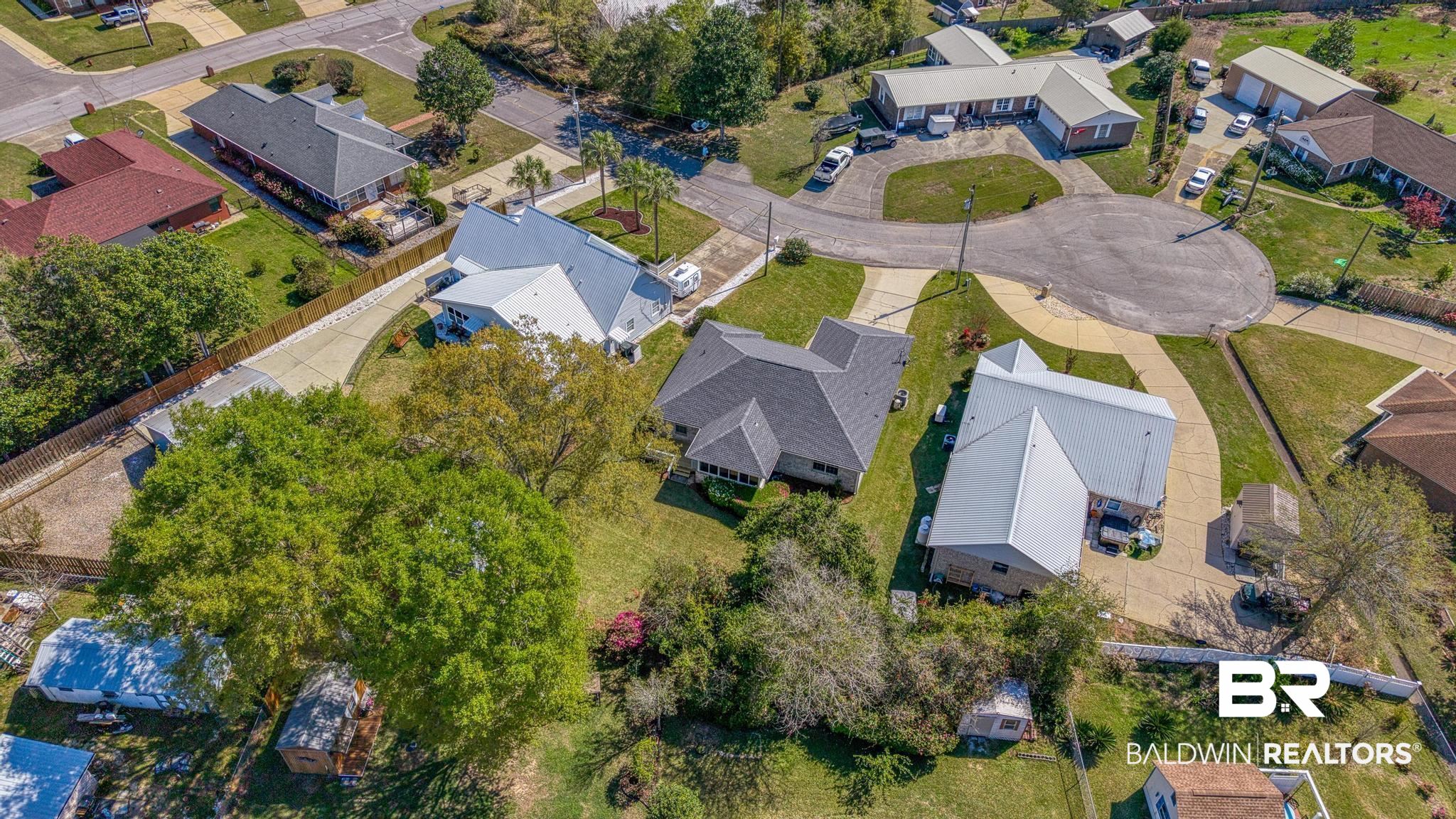 2881 Eslava Circle Lillian, AL 36549 - Photo 37 of 58 Aerial perspective of suburban area