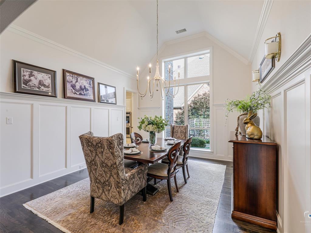 3117 Callander The Colony, TX 75056 - Photo 11 of 40 Dining room with floor to ceiling windows, vaulted ceilings and chandelier