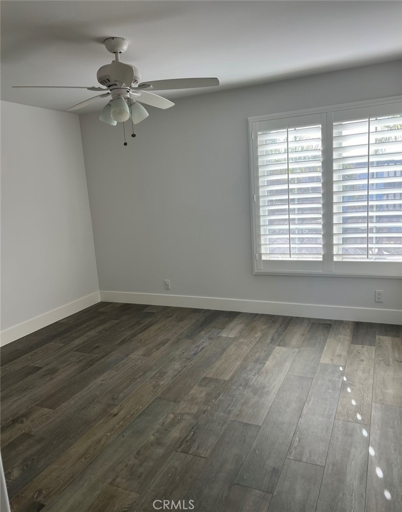 2929 Sandy Pointe, Unit 19 Del Mar, CA 92014 - Photo 16 of 17 wooden floor in an empty room with a window