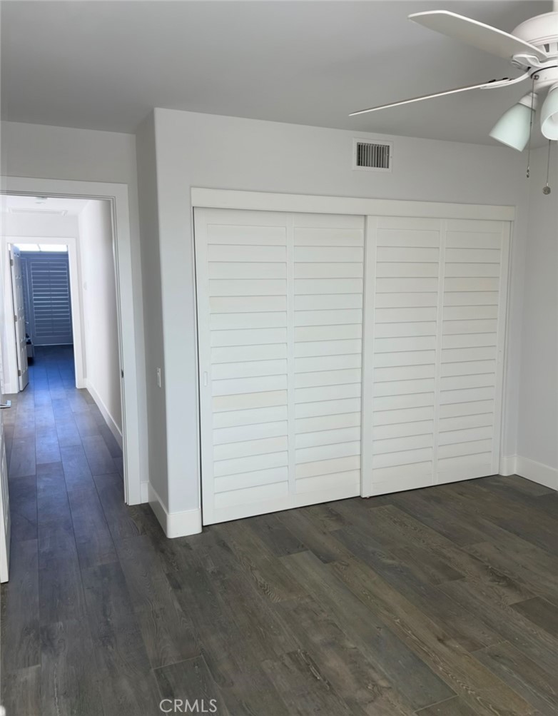 2929 Sandy Pointe, Unit 19 Del Mar, CA 92014 - Photo 17 of 17 an empty room with wooden floor and closet