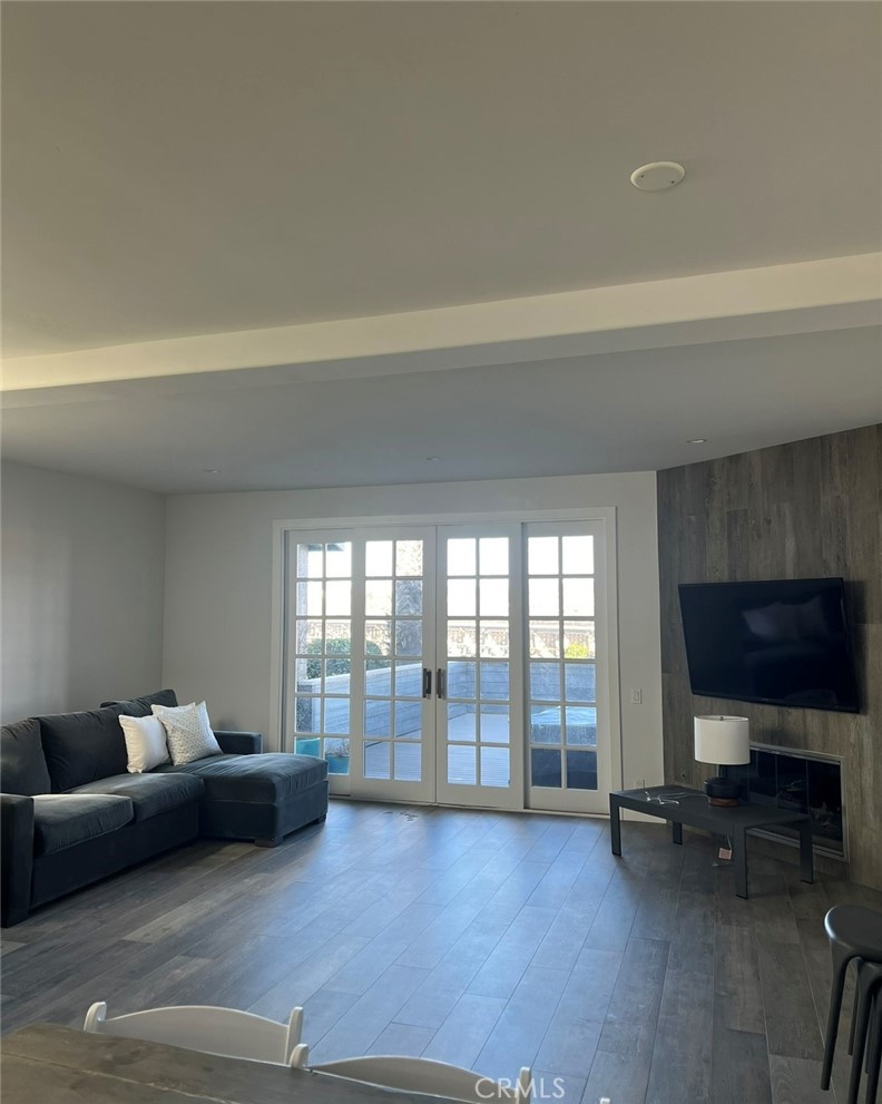 2929 Sandy Pointe, Unit 19 Del Mar, CA 92014 - Photo 5 of 17 a living room with furniture and a flat screen tv