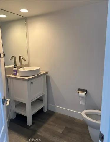 a bathroom with a sink and a toilet