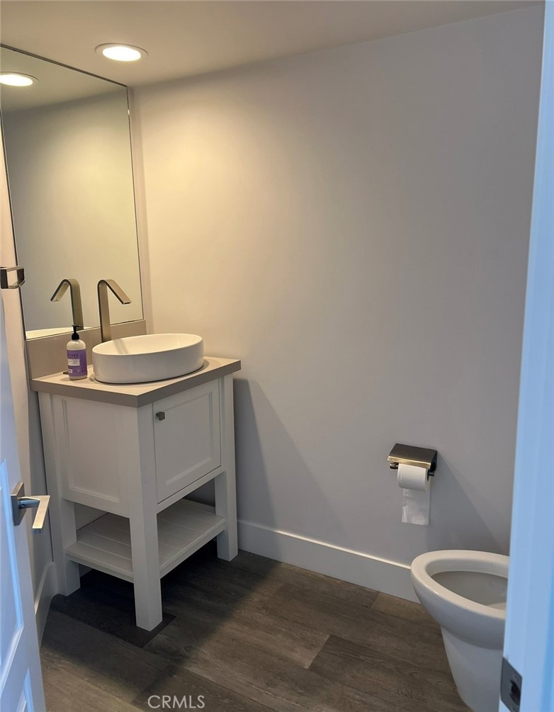 2929 Sandy Pointe, Unit 19 Del Mar, CA 92014 - Photo 7 of 17 a bathroom with a sink and a toilet