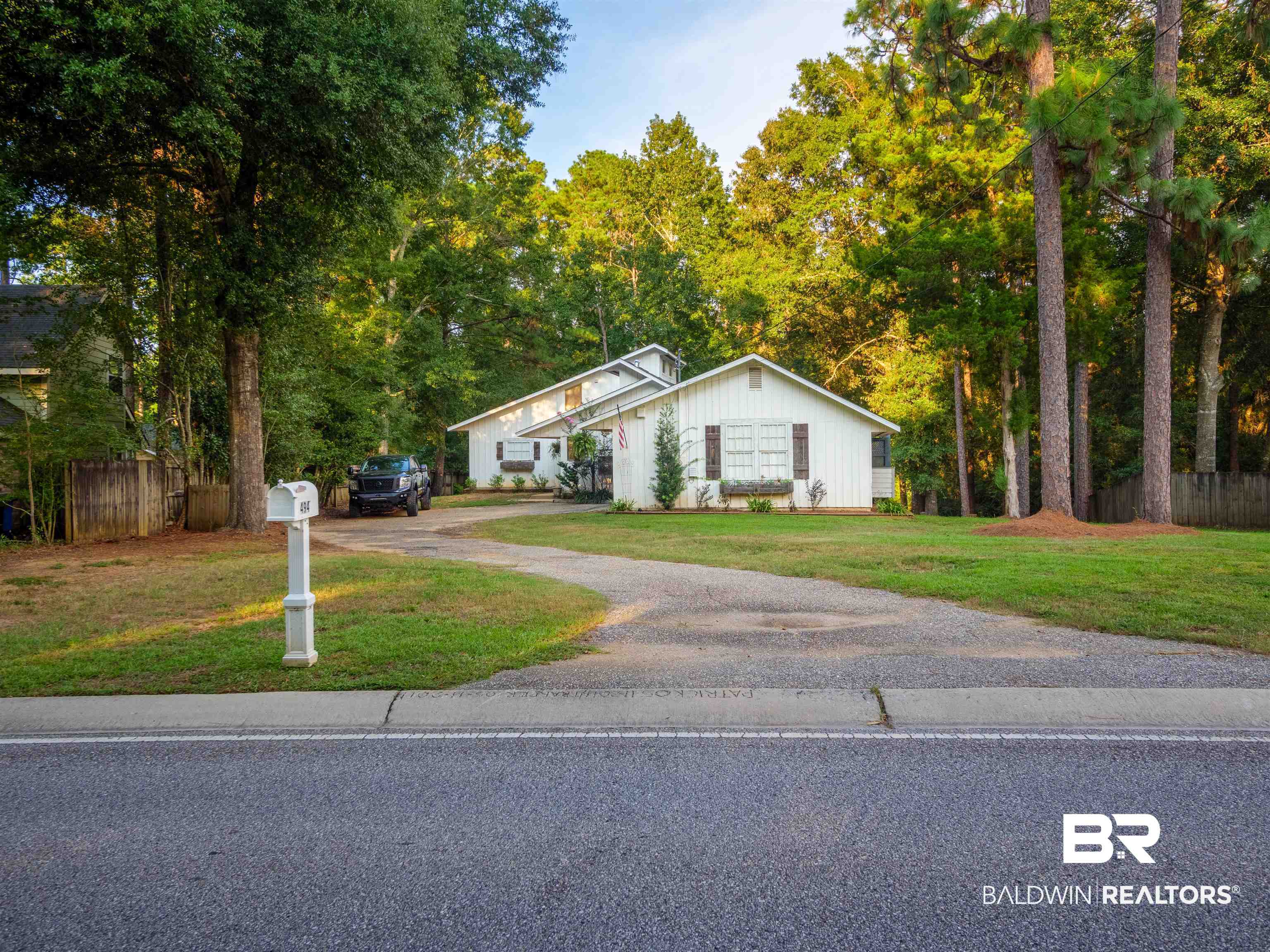 494 Ridgewood Drive Daphne, AL 36526 - Photo 2 of 40 View of front of property featuring a front yard