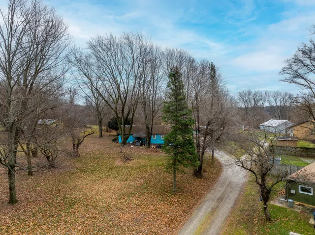 a view of road with trees