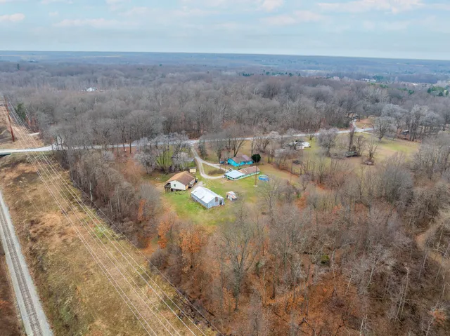 a kitchen with a sink stove and refrigerator