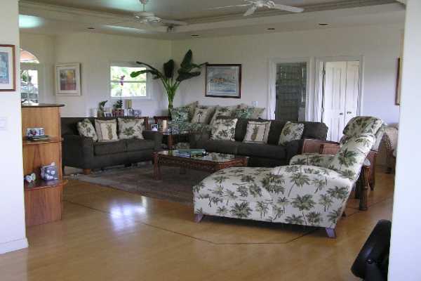 1534 Pe'e Road Koloa, HI 96756 - Photo 7 of 14 a living room with furniture and a fireplace