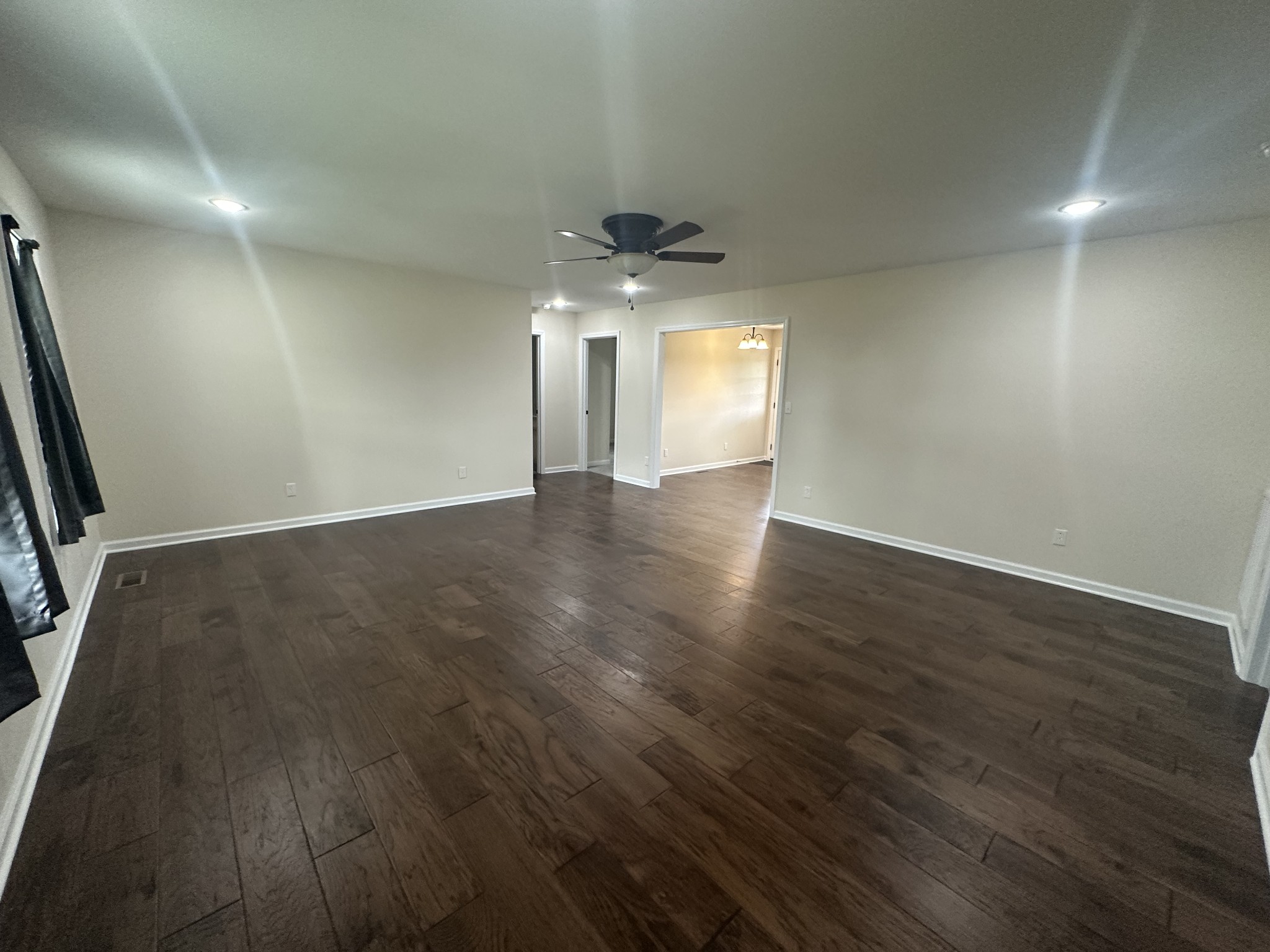 1654 Linville Road Lawrenceburg, TN 38464 - Photo 25 of 33 wooden floor in an empty room with a window