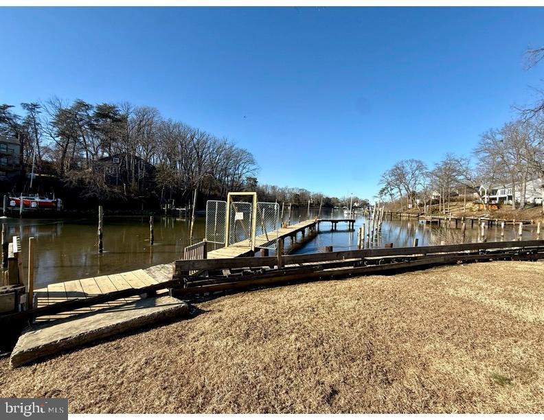 130 Brent Road Arnold, MD 21012 - Photo 45 of 46 a view of a lake with a house in the background