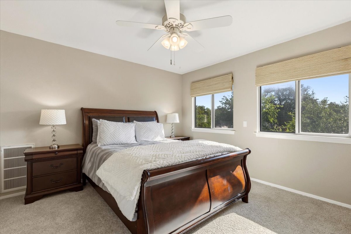 12400 Rusted Nail Cove Austin, TX 78750 - Photo 19 of 31 Two upstairs secondary bedrooms provide comfortable accommodations for family or guests.