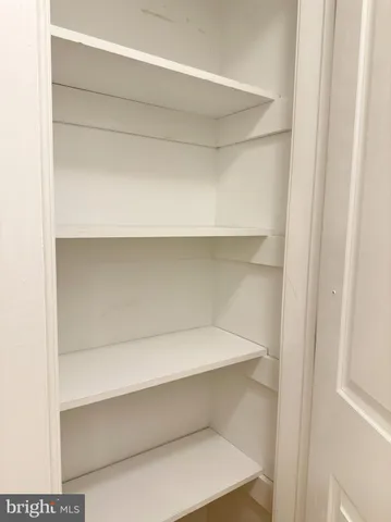 a view of a bathroom from the hallway