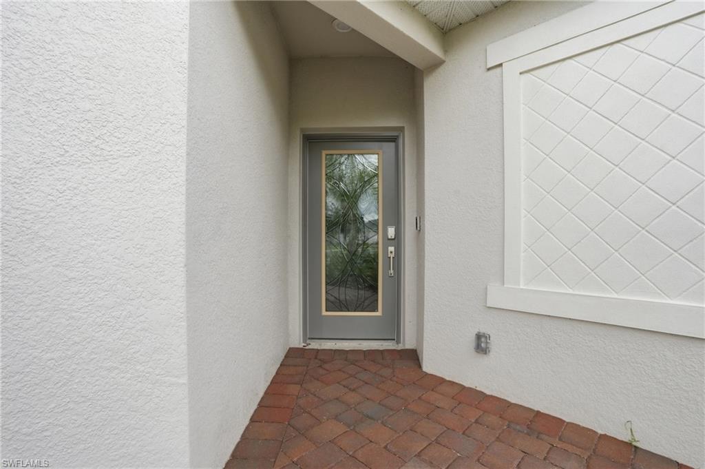2215 Dragonfruit Way Naples, FL 34120 - Photo 4 of 38 a view of an entryway door