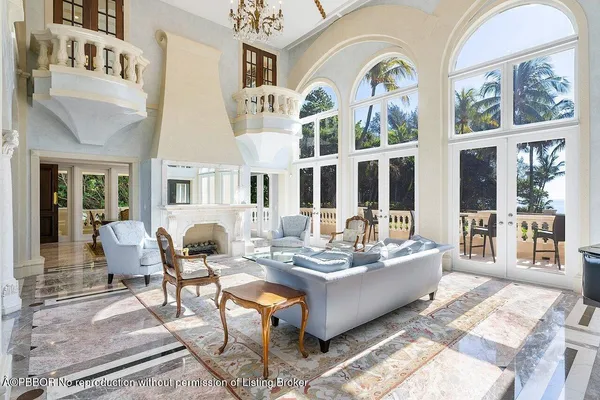 a living room with fireplace furniture